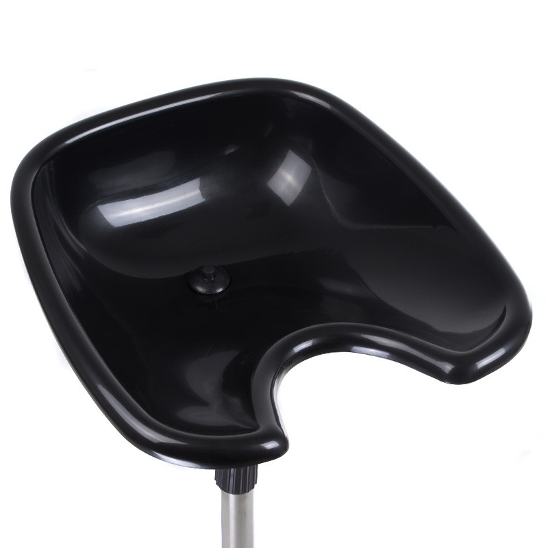 Black shampoo basin on stand