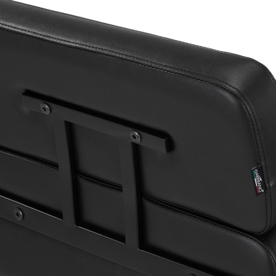 Czarny fotel fryzjerski z podnóżkiem