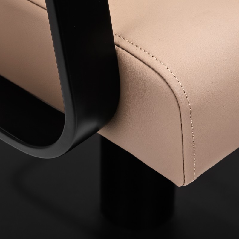 Black and beige hairdressing chair