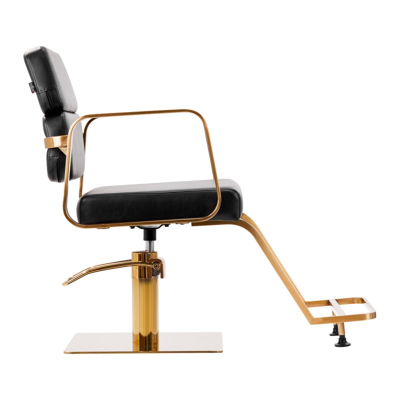 Gold accented black barber chair