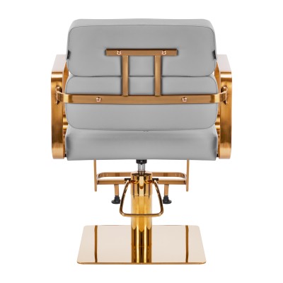 Szary fotel fryzjerski złote akcenty