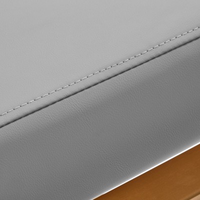 Szary fotel fryzjerski ze złotem