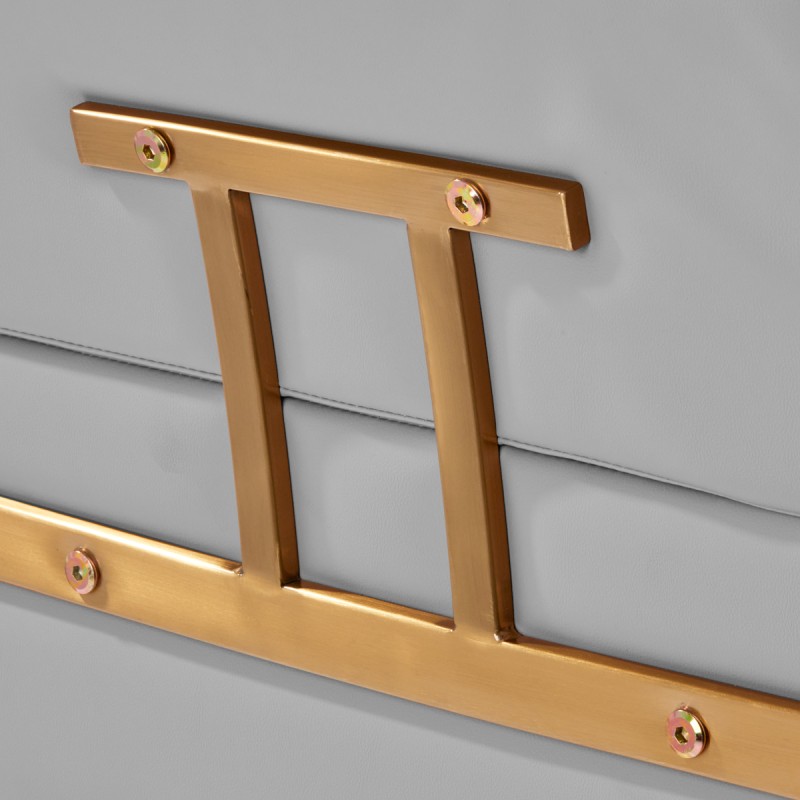 Szary fotel fryzjerski złote detale