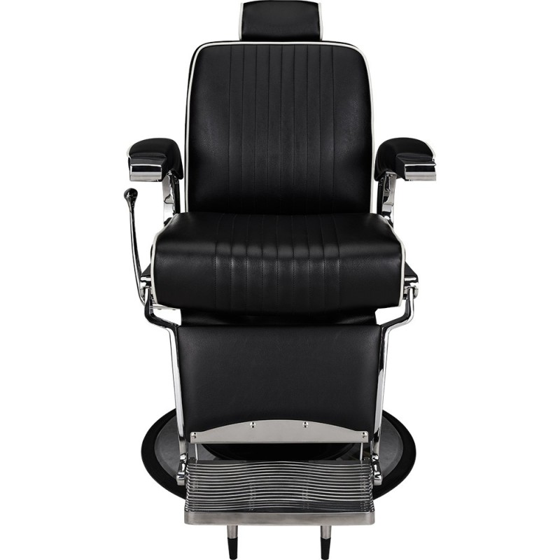 Black barber chair, chrome-disk base