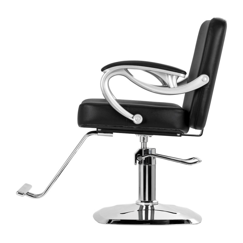 Czarna krzesło fryzjerskie z podnóżkiem.
