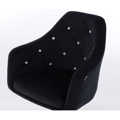 Czarne welurowe krzesło złota podstawa