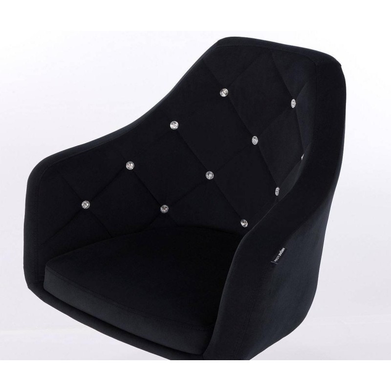 Czarne welurowe krzesło złota podstawa