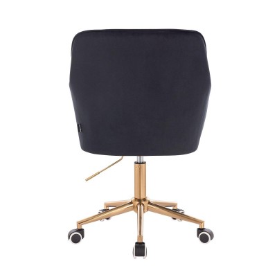 Czarne welurowe krzesło złota podstawa