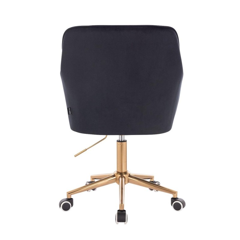 Czarne welurowe krzesło złota podstawa