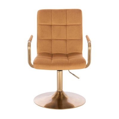 Miodowy welurowy fotel złota podstawa