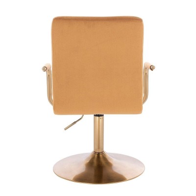 Miodowy welurowy fotel złota podstawa