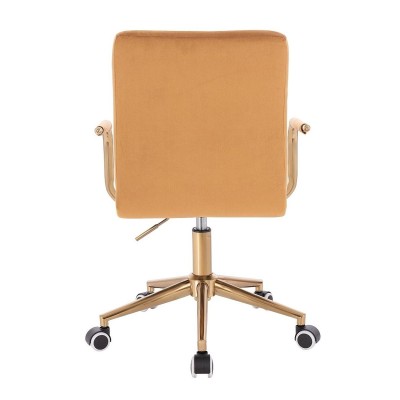 Miodowy welurowy fotel kosmetyczny złoty