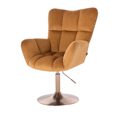 Miodowy welurowy fotel złota podstawa