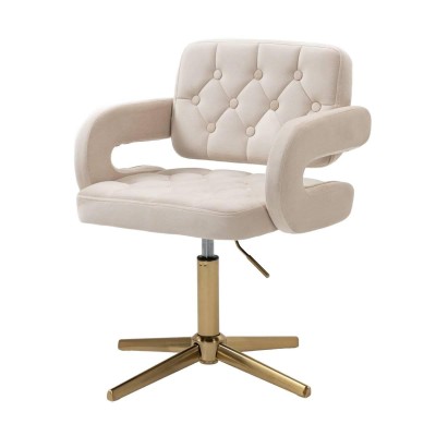 Kremowe welurowe krzesło złoty krzyżak