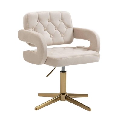 Kremowe welurowe krzesło złoty krzyżak