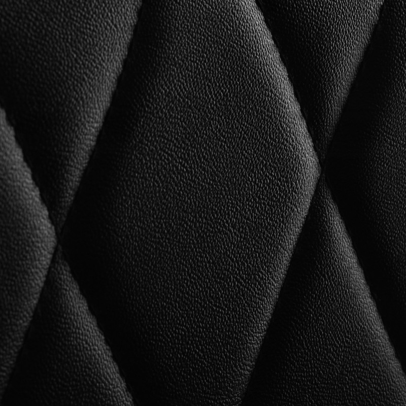 Czarna fryzjerska krzesło o eleganckim nowoczesnym designie