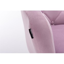 Welurowy wrzosowy fotel złote kółka