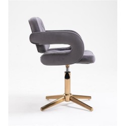 Welurowy grafitowy fotel złoty krzyżak