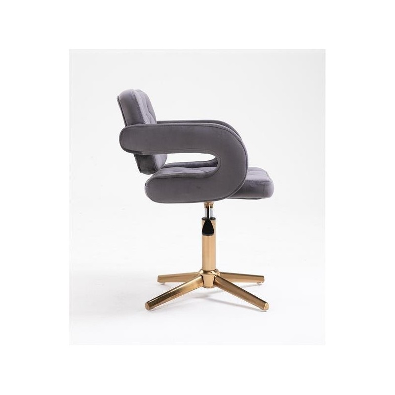 Welurowy grafitowy fotel złoty krzyżak