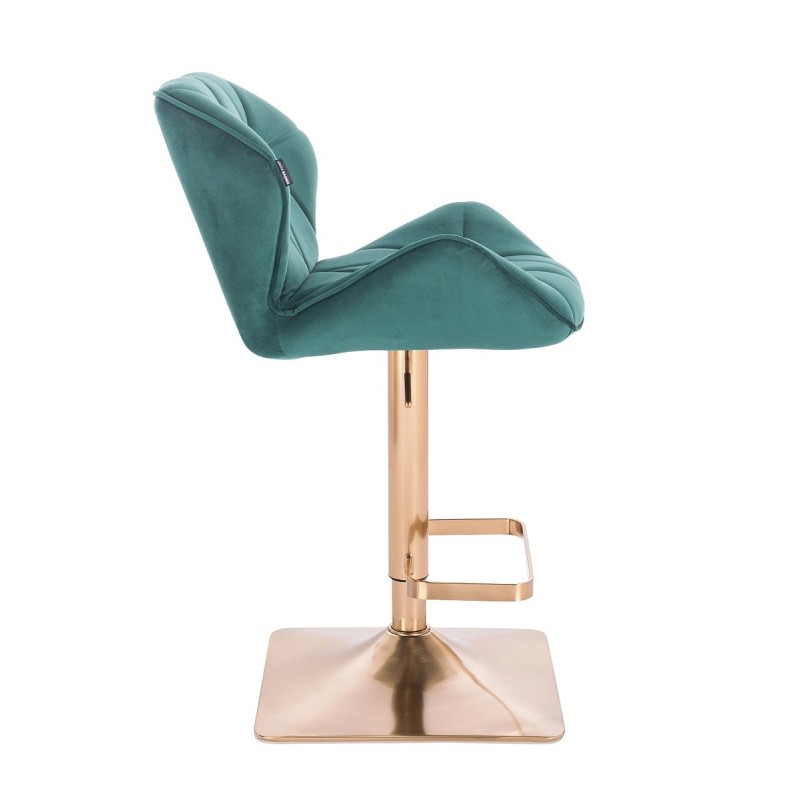 Welurowe butelkowo-zielone krzesło złota podstawa