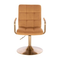 Miodowy welur fotel złota podstawa