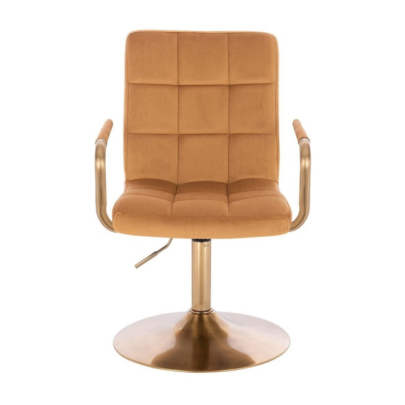 Miodowy welur fotel złota podstawa