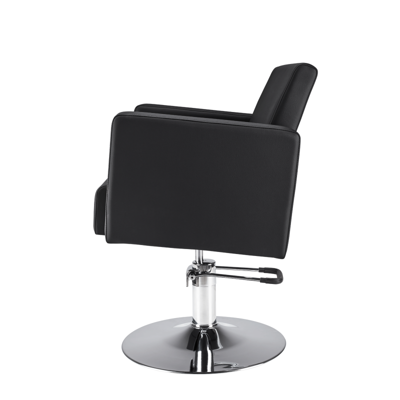 Czarny fotel fryzjerski na dysku