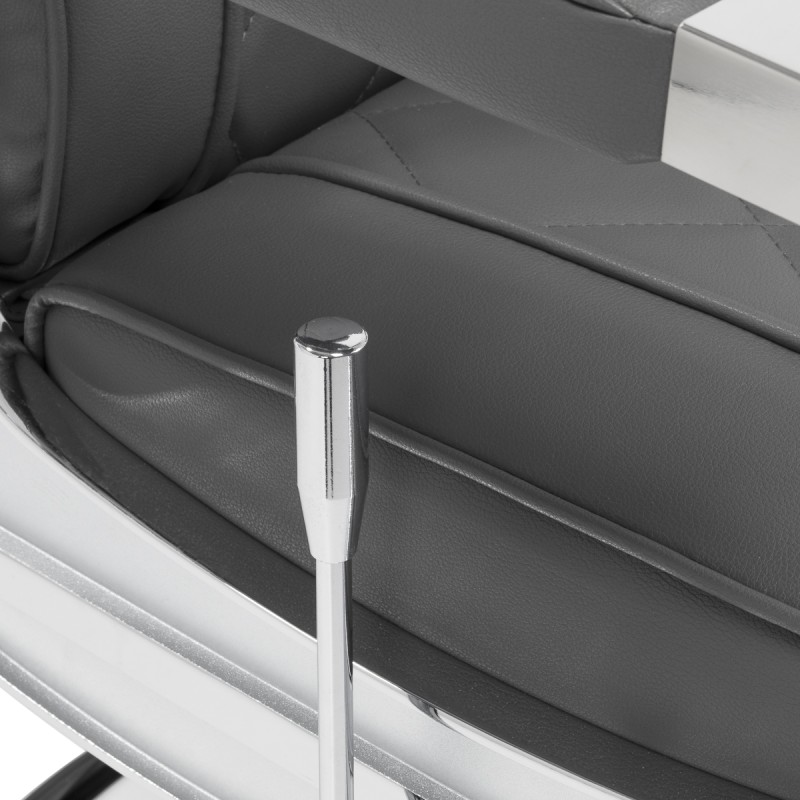 Szara fryzjerska fotele, nowoczesny design.