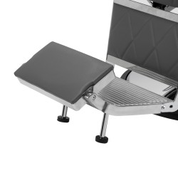 Szara fryzjerska fotele, nowoczesny design.