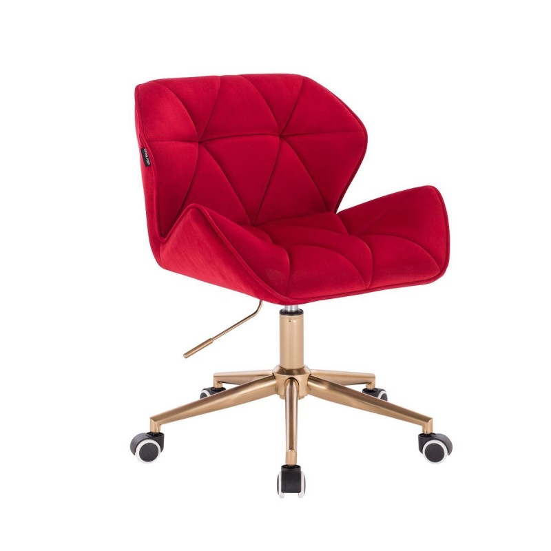 Red velvet chair, gold wheels