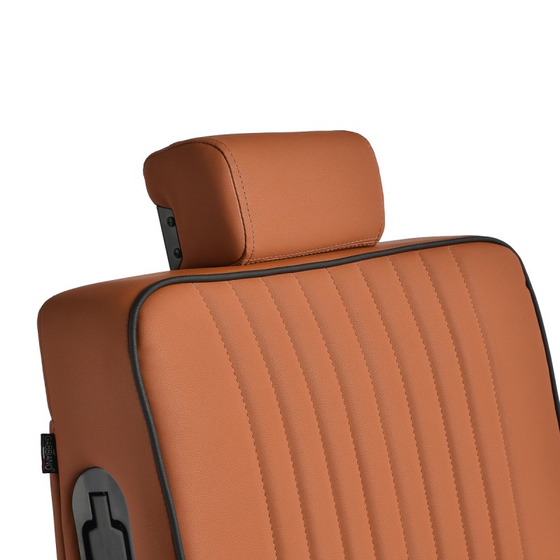 Brown leather barber chair closeup