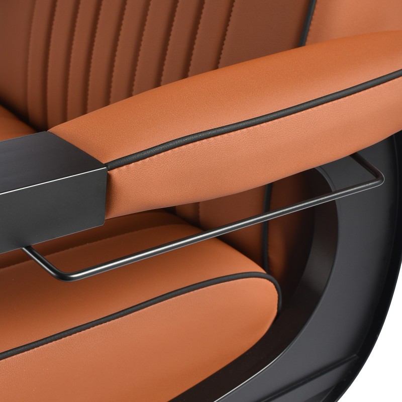 Brown leather barber chair reclined