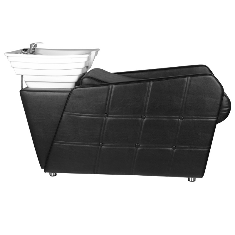 Czarna fryzjerska krzesło z podnóżkiem