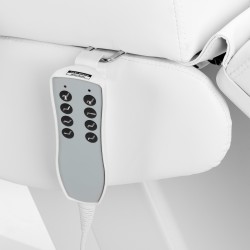 Biały elektryczny fotel do zabiegów kosmetycznych.