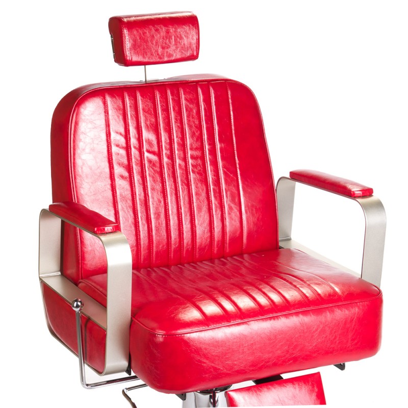 Padded red leather barber chair