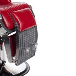 Czerwony barberski fotel z podnóżkiem