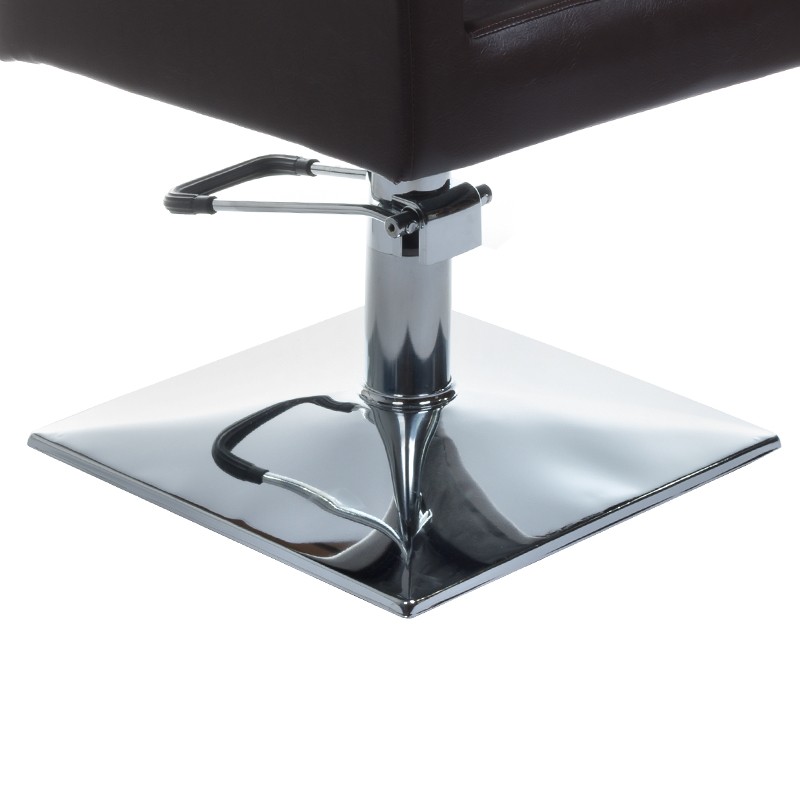 Cream upholstered barber chair