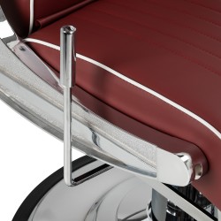 Red upholstered barber chair chrome