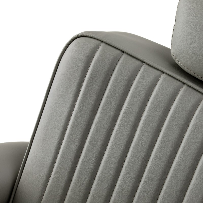 Szary barberski fotel z chromem