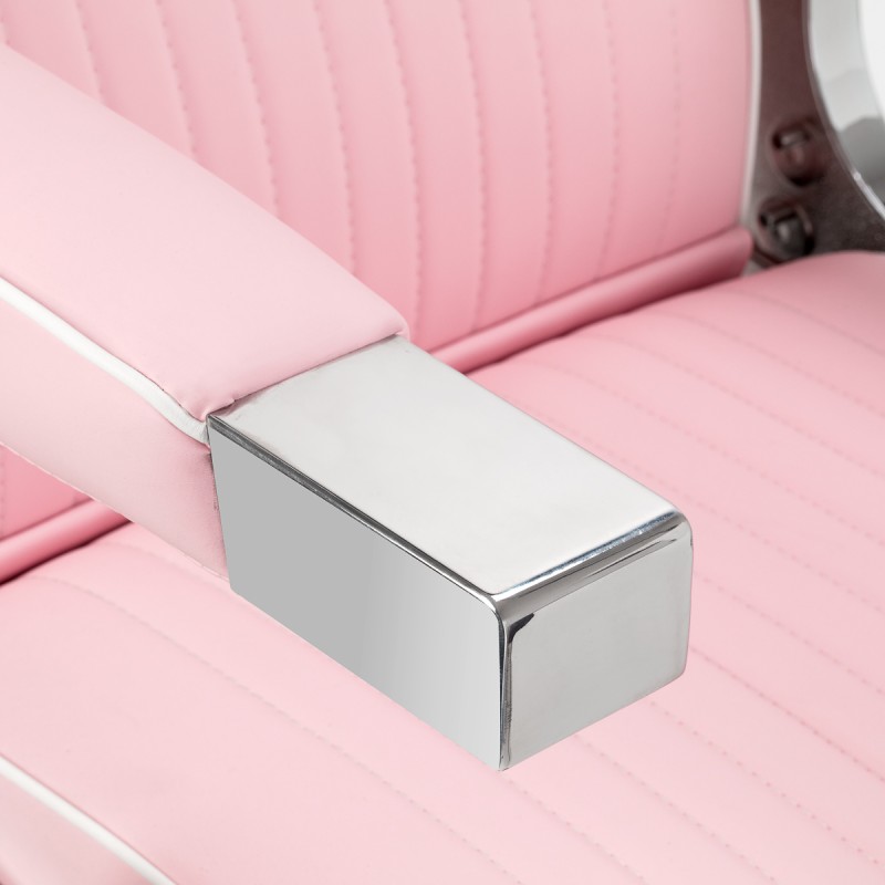 Różowy chromowany fotel barberski