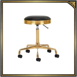 Złoty obrotowy taboret kosmetyczny