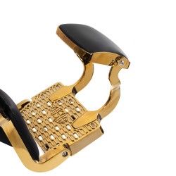 Gold-accented black barber chair